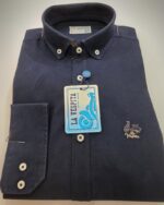Camisa azul marino La Vespita doblada