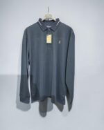 Polo técnico azul marino de manga larga visto de frente